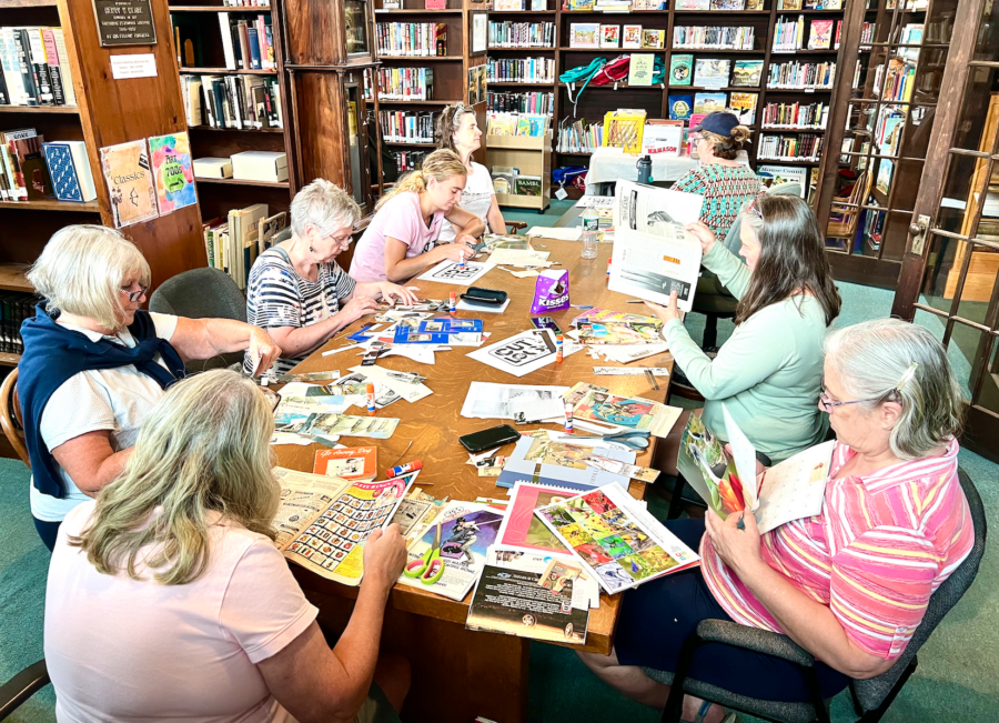 Library collage workshop participants creating art together.