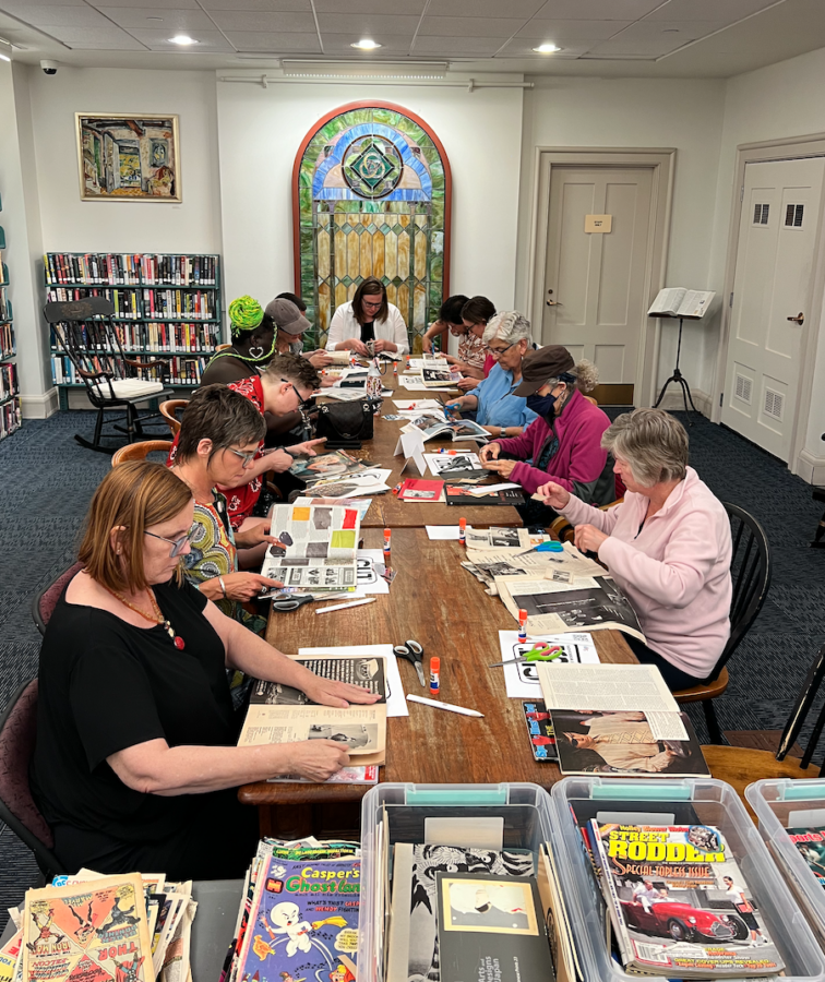 Library collage workshop participants creating art together.