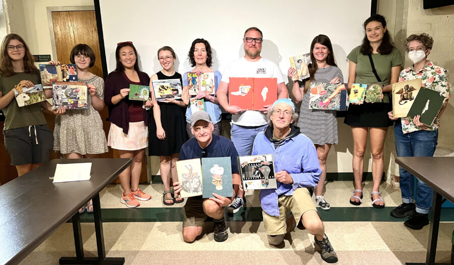 Library collage workshop participants creating art together.