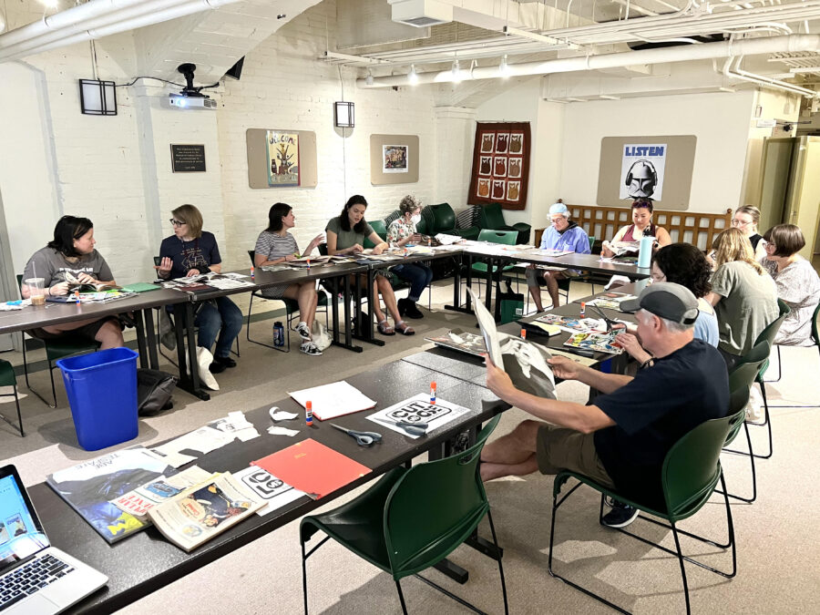 Library collage workshop participants creating art together.